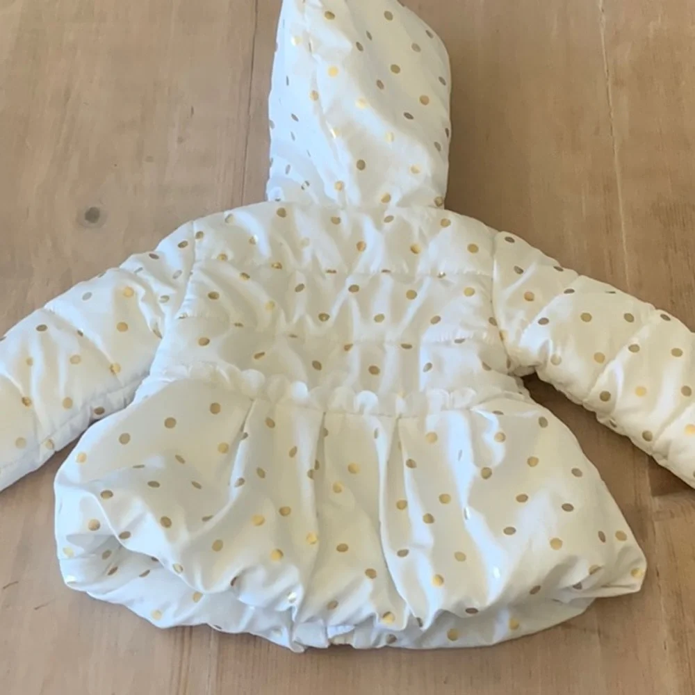 White Jackets with gold circles. Puffy. Like new. size = 12 months
